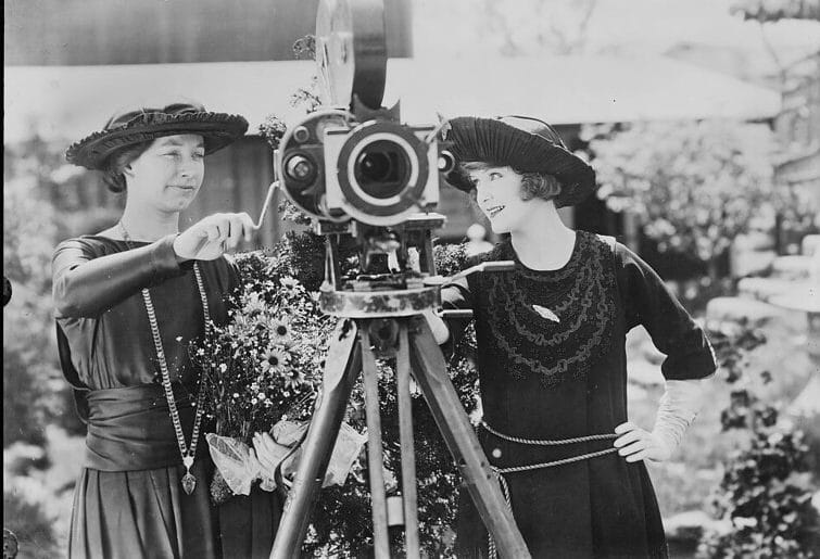 Two women filming to market their event